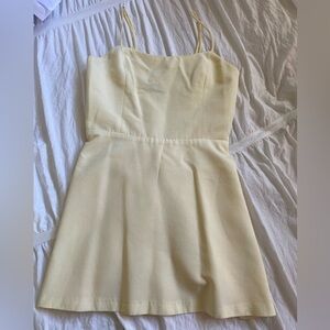 Cute mini dress with built in shorts and adjustable spaghetti straps!